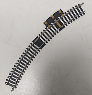 RAIL COURBE R325 12 3/4° ALIMENTATION